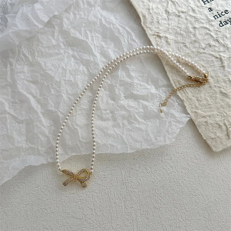 Elegant Pearl Bow Necklace