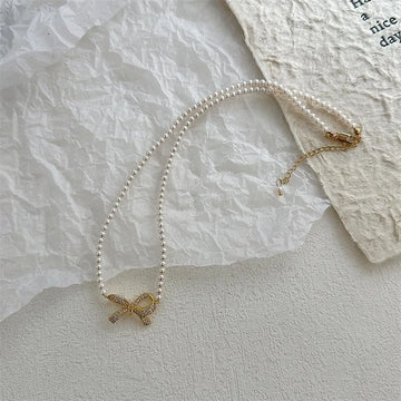Elegant Pearl Bow Necklace