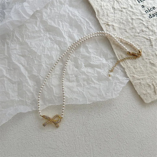 Elegant Pearl Bow Necklace
