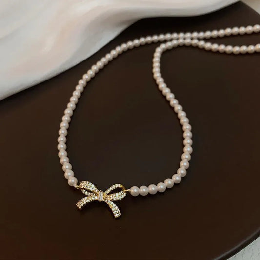 Elegant Pearl Bow Necklace